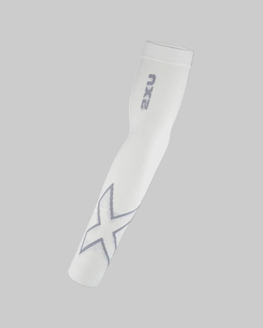 White compression sleeve with '2XU' branding on a gray background